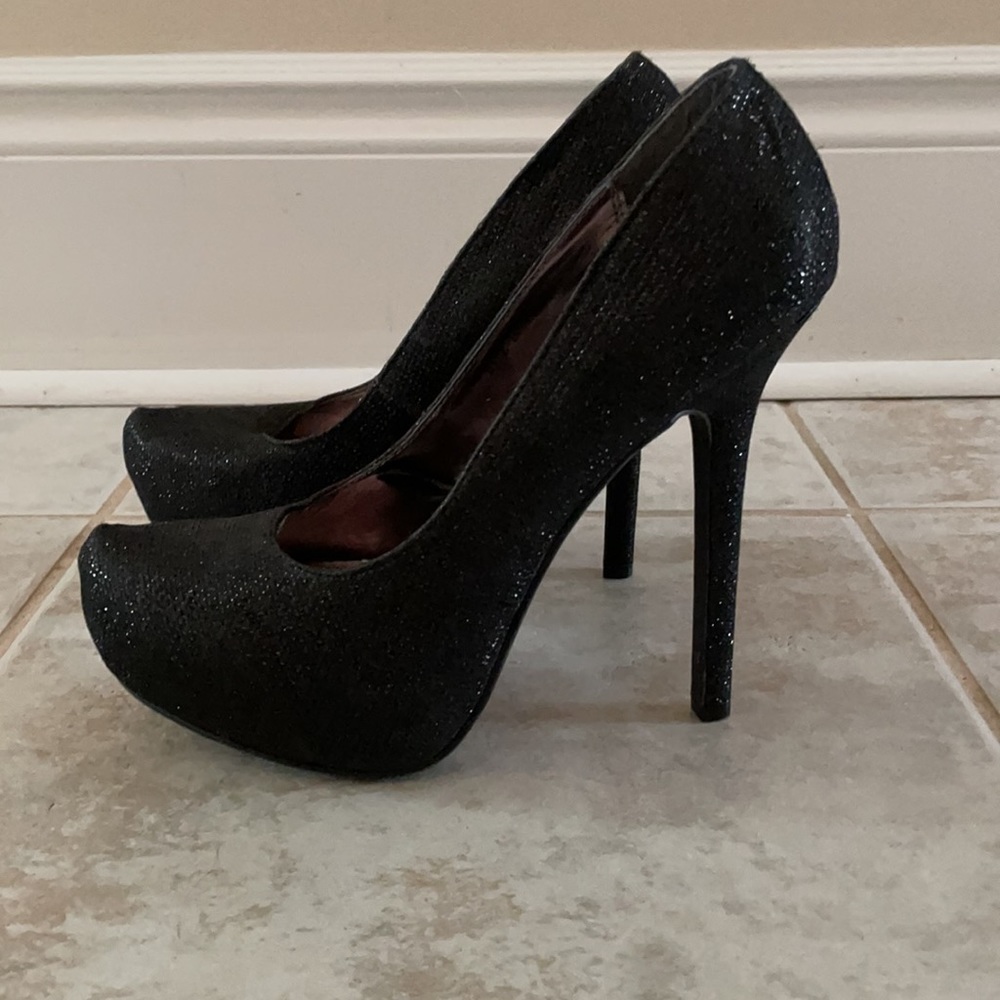 Comfortable black sparkle platform heels.